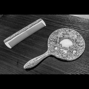 Sterling silver plated vanity hand mirror and comb